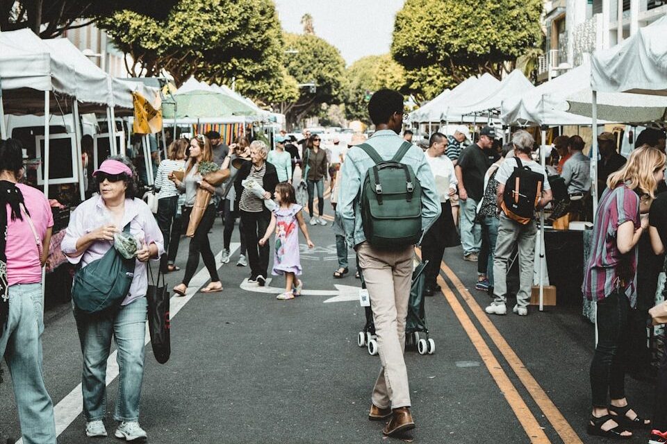 people walking on walkway during daytime