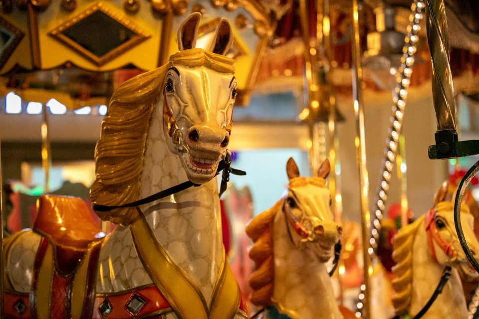 A merry go round with horses on it