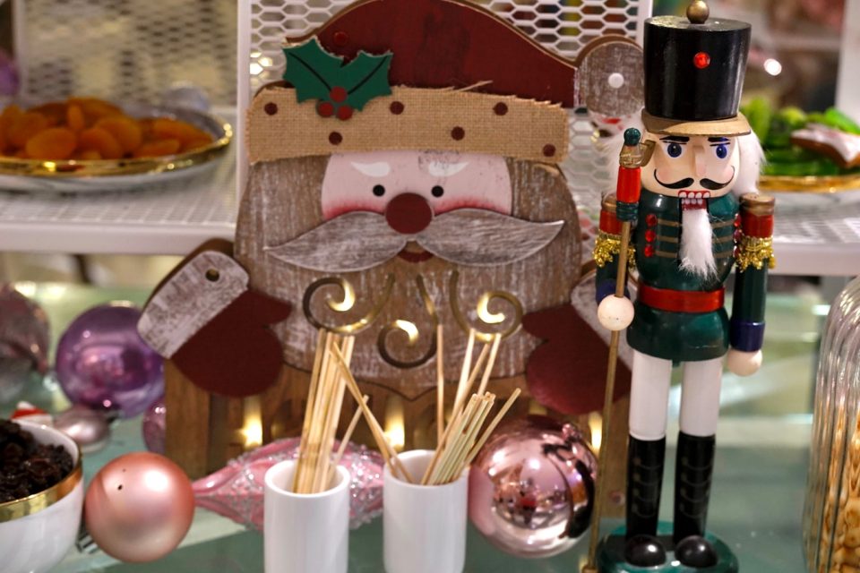 a nutcracker and a nutcracker figurine on a table